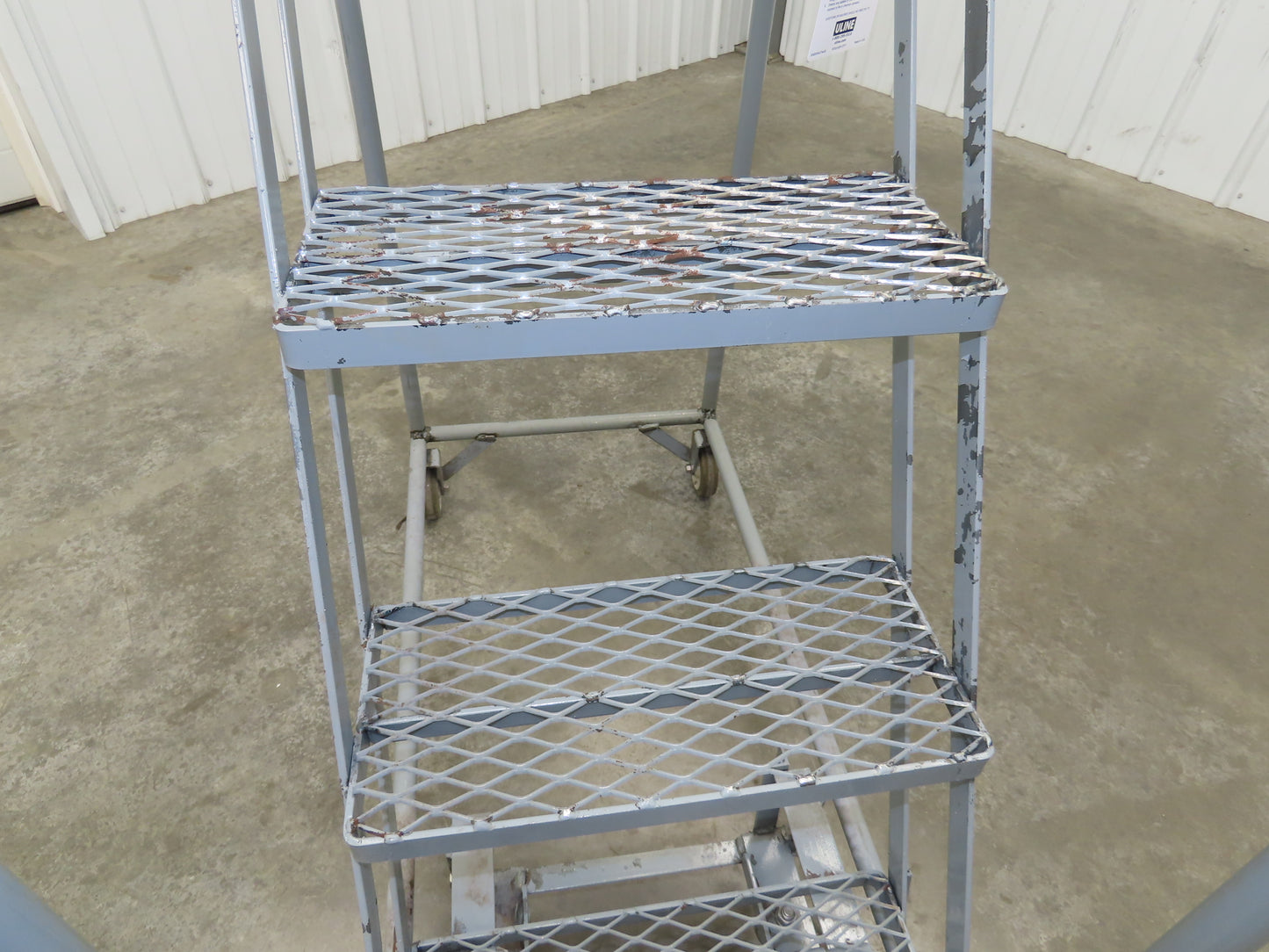 Uline H-5073A-10 Rolling Ladder Narrow Aisle 5 Step 10" Platform 50" Top Step