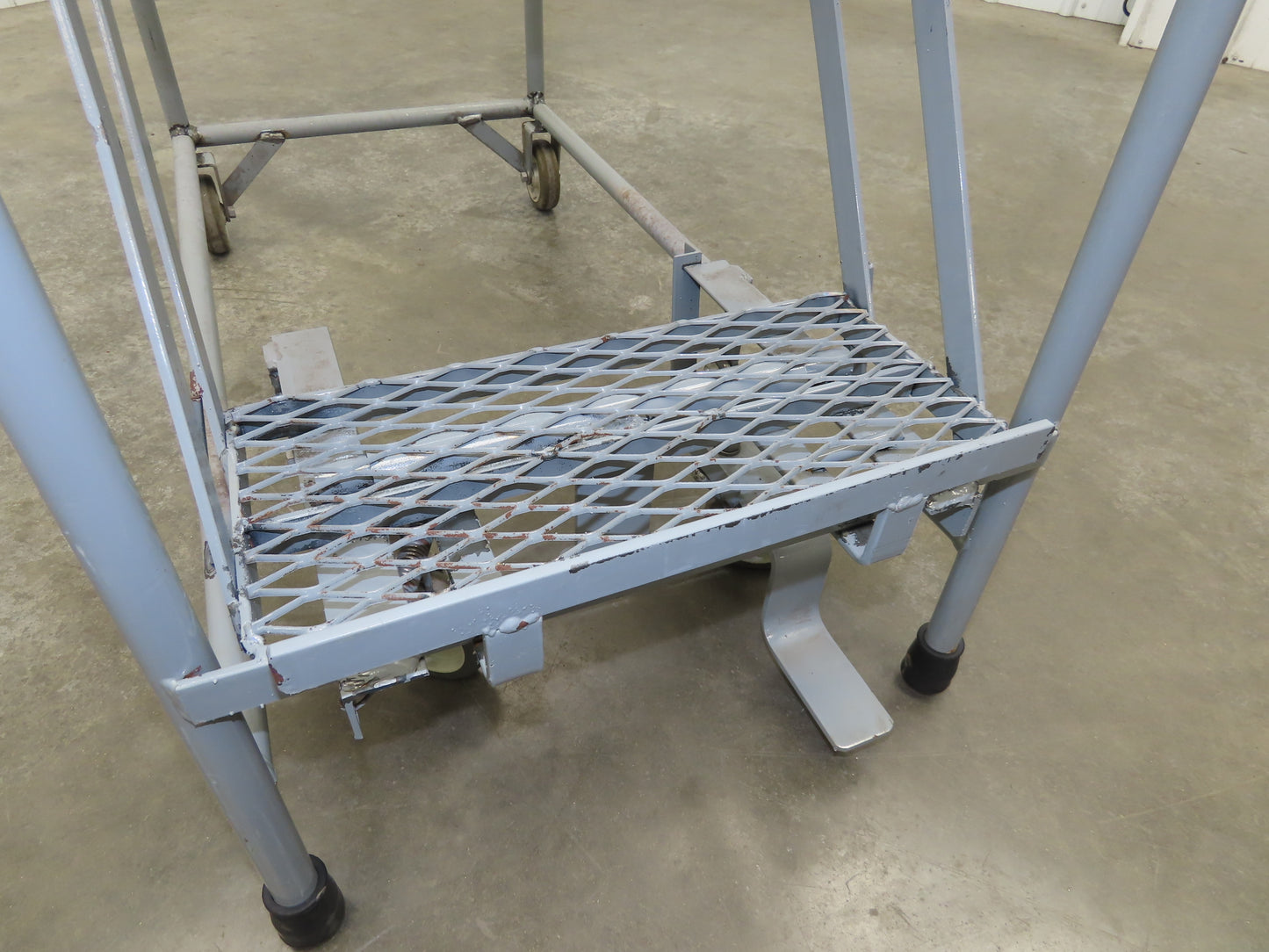 Uline H-5073A-10 Rolling Ladder Narrow Aisle 5 Step 10" Platform 50" Top Step