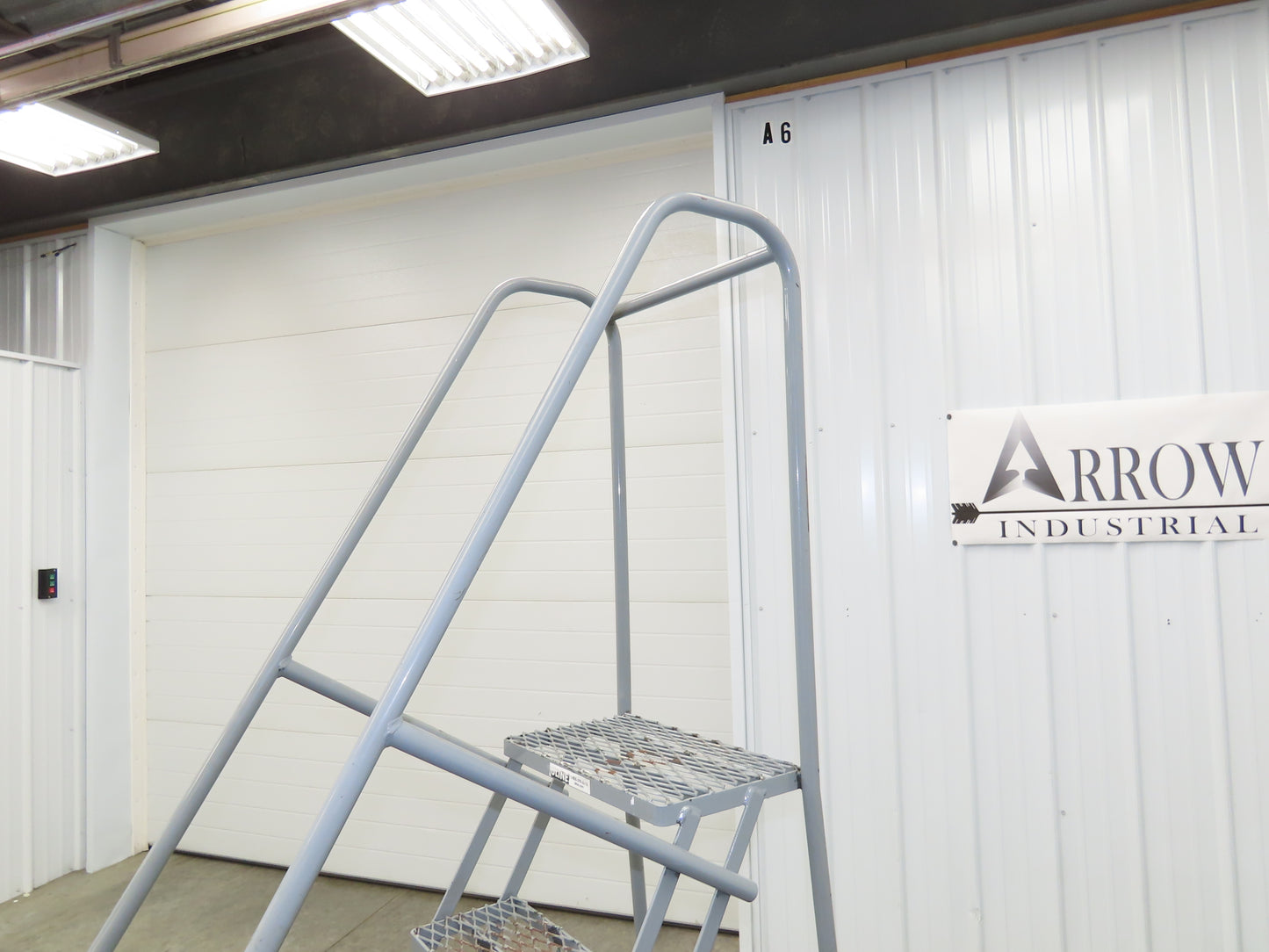 Uline H-5073A-10 Rolling Ladder Narrow Aisle 5 Step 10" Platform 50" Top Step