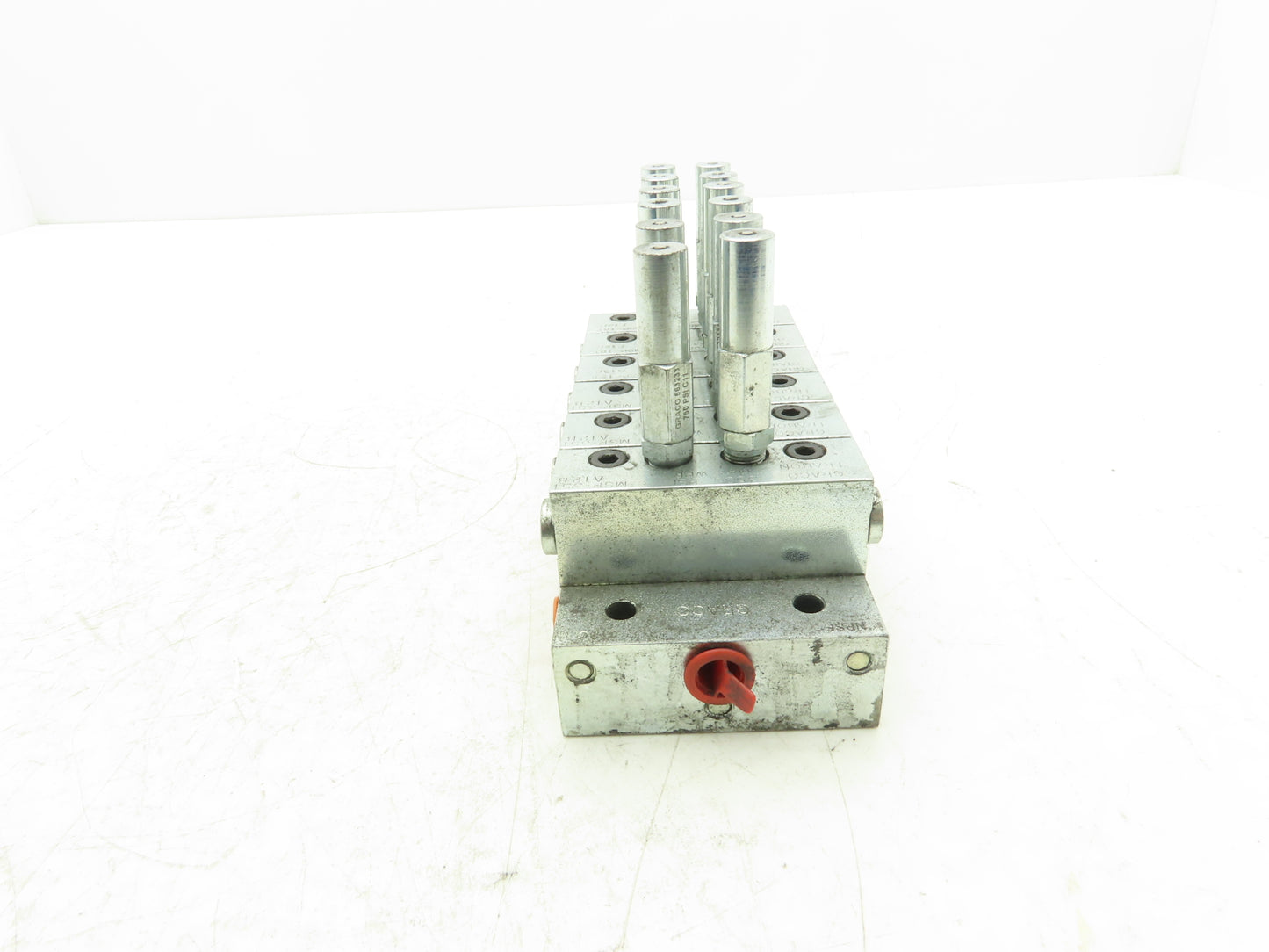 Graco 24G488 6 Section Modular NPSF Base Plate & Trabon MSP Divider Valves